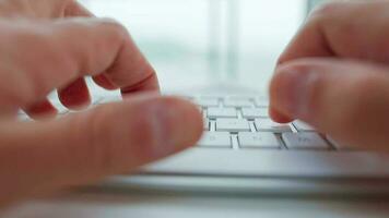 Male hands typing on a computer keyboard extreme close-up. Concept of remote work. video