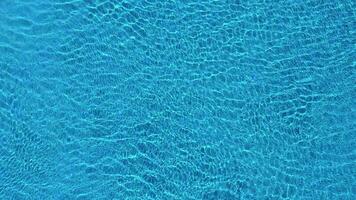 Topview from a drone over the surface of the pool video