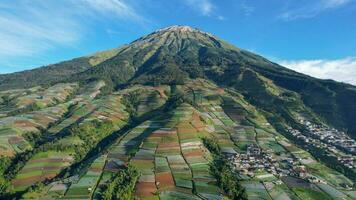 Aerial view of the Nepal van java is a Rural tour on the slopes of mount sumbing, The beauty of building houses in the countryside of the mountainside. Magelang, Indonesia, December 6, 2021 photo
