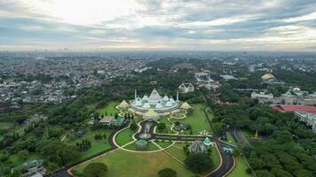 Aerial View of Museum Purna Bhakti Pertiwi Indonesian National Veteran Museum Taman Mini Indonesia Indah with Mountain view. Jakarta, Indonesia, March 8, 2022 photo