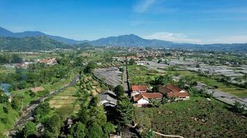 Aerial view of The Taman Bunga Nusantara or Flower Garden Nusantara, a travel destination located in Cianjur. Cianjur, Indonesia, July 6, 2022 photo