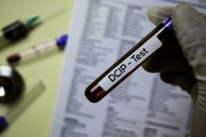 DCIP - Test with blood sample. Top view isolated on office desk. Healthcare Medical concept photo