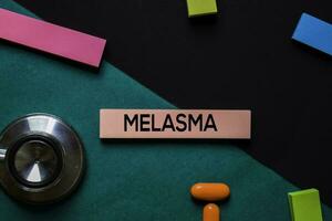 Melasma text on sticky notes. Office desk background. Medical or Healthcare concept photo