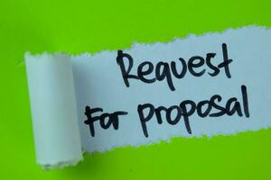Request For Proposal Text written in torn paper photo