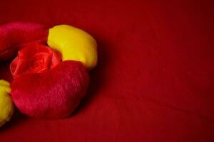 Pillow hearts shape on red background with copy space. Happy Valentine's day photo