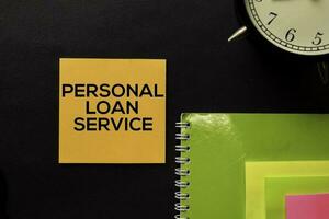 Personal Loan Service text on top view office desk table of Business workplace and business objects. photo