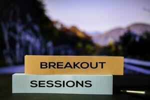 Breakout Sessions on the sticky notes with bokeh background photo