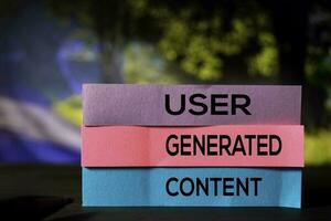 User Generated Content on the sticky notes with bokeh background photo