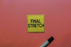 Final Stretch write on sticky notes isolated on Pink background. photo