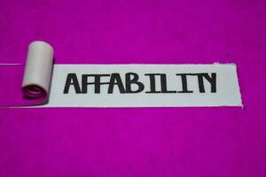 Affability text, Inspiration and positive vibes concept on purple torn paper photo