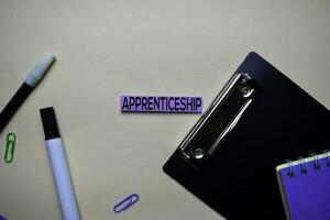 Apprenticeship text on sticky notes with office desk concept photo