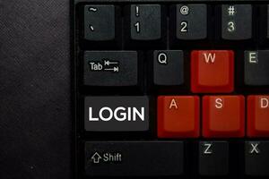 Login isolated on laptop keyboard background photo