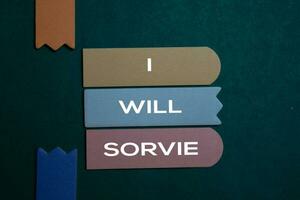 I Will Sorvie write on a sticky note isolated on Office Desk photo