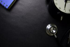 Stethoscope isolated on black background. Healthcare Medical concept photo