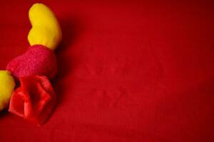 Pillow hearts shape on red background with copy space. Happy Valentine's day photo