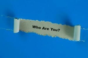 Who Are You Text written in torn paper photo