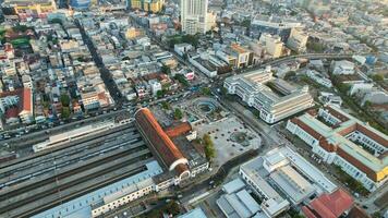 Aerial view of Jakarta Kota Train Station with Jakarta cityscape background. Jakarta, Indonesia, August 30, 2022 photo