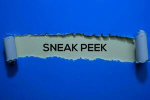 Sneak Peek Text written in torn paper photo