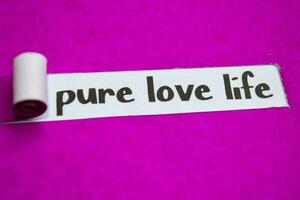 Pure Love Life text, Inspiration, Motivation and business concept on purple torn paper photo