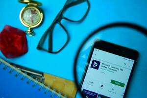 Microsoft Dynamics 365 Unified Operations dev app with magnifying on Smartphone screen. is a freeware web browser developed by Microsoft Corporation photo