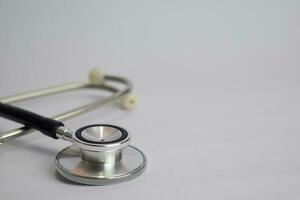 Close up Black stethoscope. Healthcare. isolated on white background photo