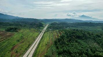 Aerial view of Cisumdawu Twin Tunnel Bandung City, Toll Gate and the Intersection which is the Beginning of the Cisumdawu Toll Road Section 1. Bandung, Indonesia, May 19, 2022 photo