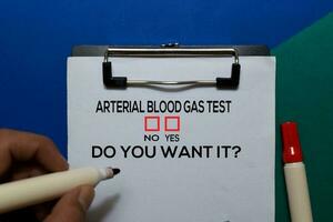 Arterial Blood Gas Test, Do You Want it Yes or No. On office desk background photo