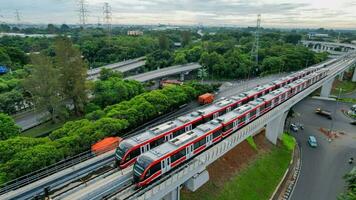 Aerial view of Jakarta LRT train trial run for phase 1 from UKI Cawang. Jakarta, Indonesia, March 8, 2022 photo