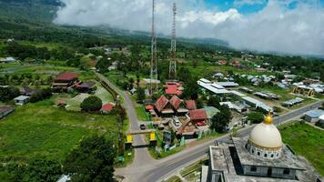 Aerial view of some agricultural fields in Sembalun. Sembalun is situated on the slope of mount Rinjani and is surrounded by beautiful green mountains. Lombok, Indonesia, March 22, 2022 photo