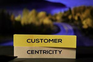 Customer Centricity on the sticky notes with bokeh background photo