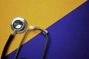 Stethoscope isolated on color background. Healthcare Medical concept photo