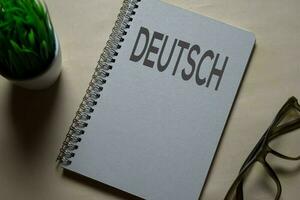 Close up Book to learn German isolated on Office Desk photo