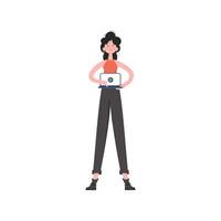 A woman stands in full growth turns on the video on a laptop. Isolated. Element for presentations, sites. vector