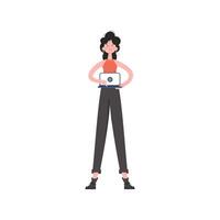 A woman stands in full growth turns on the video on a laptop. Isolated. Element for presentations, sites. vector