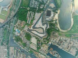 Aerial view of the Beautiful scenery of Jakarta Formula E Circuit. with Jakarta cityscape background. Jakarta, Indonesia, May 6, 2022 photo