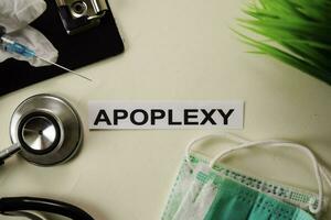 Apoplexy with inspiration and healthcare medical concept on desk background photo