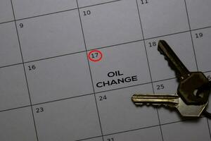 Oil Change write on calendar. Date 17. Reminder or Schedule Concepts photo