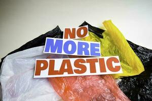 No more plastic message. It shows a plastic with motto and selective focus no more plastic text. photo