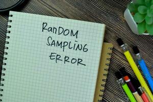 Concept of Random Sampling Error write on a book isolated on Wooden Table. photo
