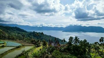 Aerial view of panorama of Maninjau Lake West Sumatra, Danau maninjau. sumatra, Indonesia, January 24, 2023 photo