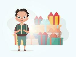 A little boy is holding a box with a bow in his hands. Christmas. Cartoon style. vector