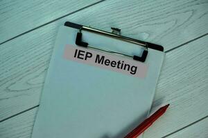 IEP Meeting write on a paperwork isolated on office desk. photo