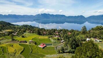 Aerial view of panorama of Maninjau Lake West Sumatra, Danau maninjau. sumatra, Indonesia, January 24, 2023 photo