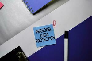 Personel Data Protection text on sticky notes with color office desk concept photo