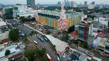 Aerial view of South Jakarta Blok M Intercity Bus Terminal. This terminal is the oldest terminal in Jakarta. Jakarta, Indonesia, September 16, 2022 photo