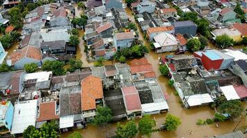 Aerial POV view Depiction of flooding. devastation wrought after massive natural disasters at Bekasi - Indonesia photo