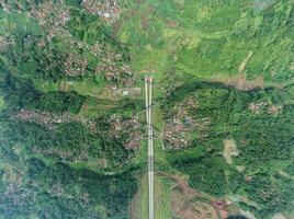 Aerial view of Cisumdawu Twin Tunnel Bandung City, Toll Gate and the Intersection which is the Beginning of the Cisumdawu Toll Road Section 1. Bandung, Indonesia, May 19, 2022 photo