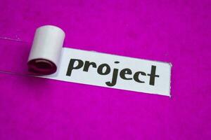 Project text, Inspiration, Motivation and business concept on purple torn paper photo