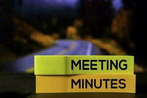 Meeting Minutes on the sticky notes with bokeh background photo