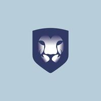 lion head logo design inside a shield in white and strong blue vector